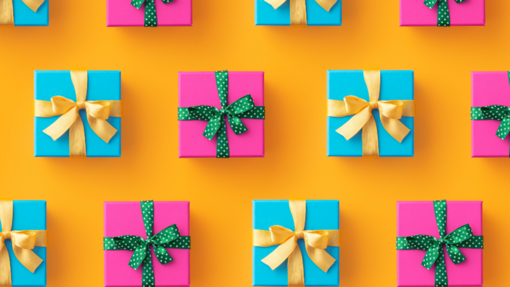 Rows of pink and blue wrapped gift boxes on an orange background