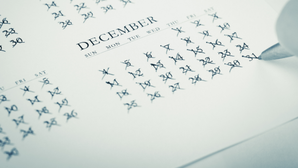 Image displaying the month of December on a calendar. Every date is crossed off indicating the end of the year.