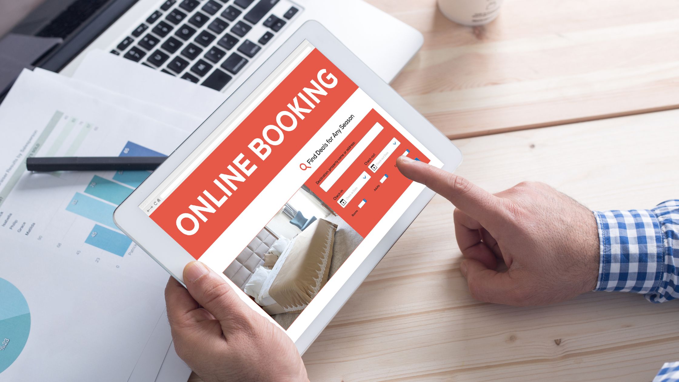 A person carefully making an online hotel booking on a safe site via an ipad